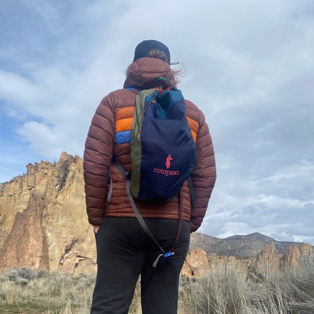 Cotopaxi Luzon 18 navy blue and olive green drawstring backpack